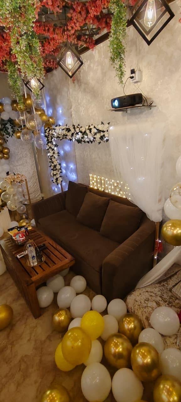 Cozy cabana lounge with hanging florals